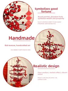 Detail of handmade red berry fortune tree with traditional New Year hanging tag