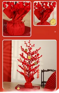 Macro detail of red berries and golden lucky coin charms on a festive New Year tree