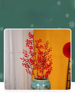 Detailed view of artificial red berry branches in a vintage vase for festive decoration