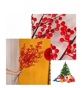 Detail of glossy red artificial berry branches for festive holiday floral arrangements