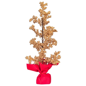 Golden artificial berry tree New Year ornament with festive red fabric base wrapping