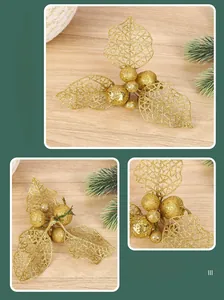 Close-up of golden hollowed Christmas berries with glitter mesh leaves for DIY holiday decor