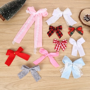 Assorted colorful DIY Christmas fabric bows with lace for tree wreaths and gift decor