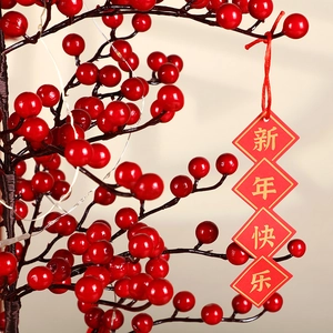 Artificial red berry tree with LED lights and Happy New Year tag for festive home decor
