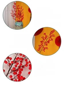Detail of red artificial berry stems for New Year decor with handcrafted branches
