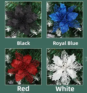 Detail of glittered poinsettia flowers in four colors for Christmas tree decoration