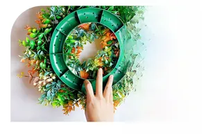 Close-up of the durable green plastic frame and base of an eucalyptus pumpkin wreath