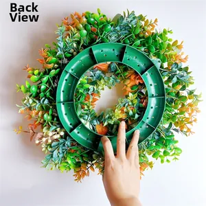 Detail view of the durable plastic support frame on the back of the pumpkin wreath