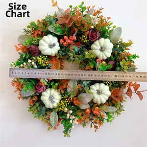 Detailed view of autumn wreath with pumpkins and berries measuring 40cm in diameter
