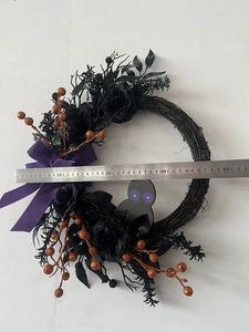 Detail view of a 40cm Halloween black owl wreath with roses and purple bow measurement