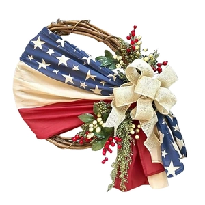 Patriotic USA flag wreath with stars and stripes fabric and beige burlap bow decoration