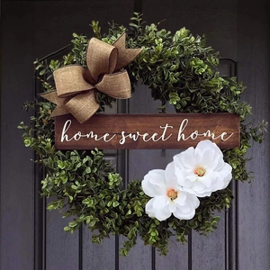 Artificial eucalyptus wreath with white magnolias and Home Sweet Home wooden sign