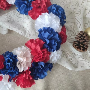 Independence Day artificial red white and blue hydrangea wreath on burlap background
