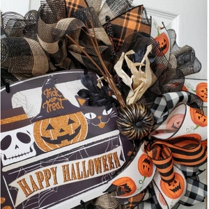 Halloween wreath with orange plaid mesh, pumpkin, and skeleton Trick or Treat sign