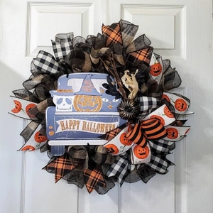 Halloween wreath with blue truck and pumpkin patterns for front door holiday decoration