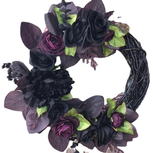 Gothic Halloween wreath with black and purple roses on woven vine base for front door decor