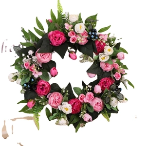 Spring peony and rose wreath with silk flowers and blue berries for door decoration