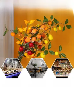 Detailed view of artificial fruit branches for home decor and festive DIY arrangements