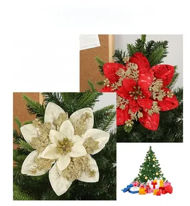 Close-up of red and beige artificial Christmas flowers with gold glitter for tree decor
