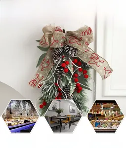 Christmas teardrop swag with burlap bow and red berries for festive wall and door decoration