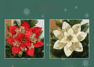 Detailed view of red and beige double-layered Christmas poinsettias with gold glitter