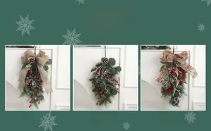 Detailed views of three Christmas teardrop swags with red berries and pine needles