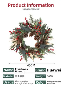 Detailed view of 45cm Christmas wreath with pine cones and red berries on white background