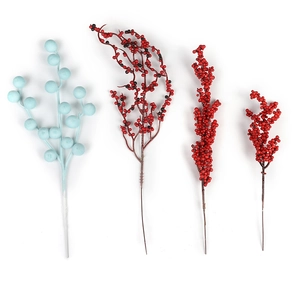 Artificial red and blue holly berry branches for Christmas and New Year home decoration