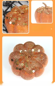 Detail of orange glitter Halloween pumpkin with gold sequins and beads from multiple angles