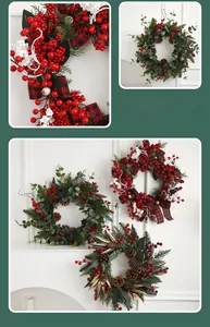 Close-up of Christmas wreath with red berries, pine cones and plaid ribbon on wall