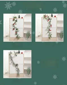 Detailed view of three artificial Christmas garland styles with red berries and snowy leaves