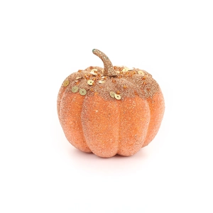 Sparkling orange pumpkin with golden sequins and glitter finish for autumn home decoration