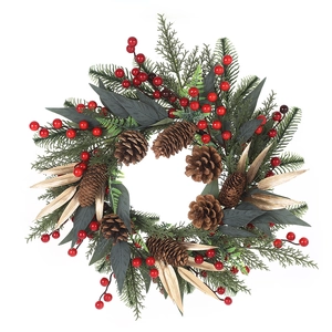 Christmas wreath with pine needles, red berries, and pine cones on a white background
