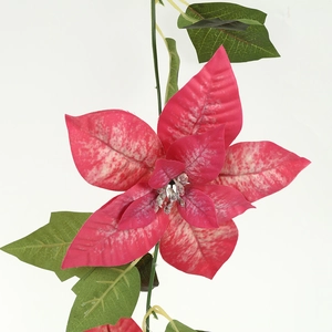 Artificial Christmas poinsettia vine with mottled red petals and green leaves for decor