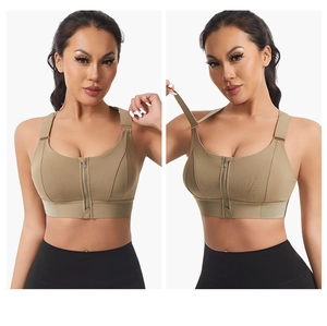 Detailed front zipper closure and adjustable wide straps on a high-impact khaki sports bra