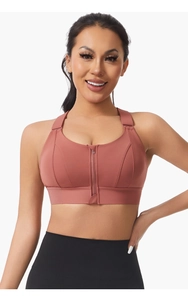 Detailed front zipper and adjustable shoulder straps on brick red high-impact sports bra
