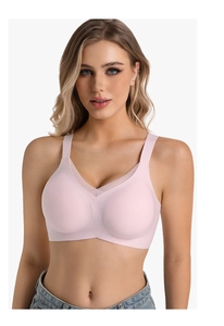 Detail view of pink seamless bra with V-neck mesh design and wide comfortable shoulder straps