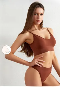 Close-up of caramel brown seamless ribbed sports bra with thin straps and matching briefs