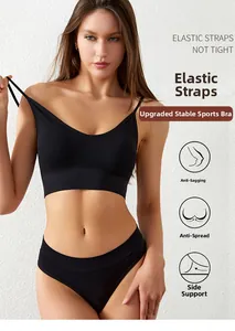 Detail of black seamless ribbed v-neck sports bra and matching mid-rise shorts