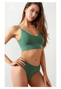 Macro detail of dark green ribbed knit seamless bra and high-waisted briefs set