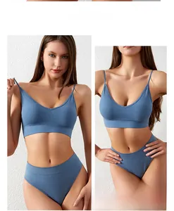 Detail of blue seamless sports bra set with ribbed texture and thin V-neck straps