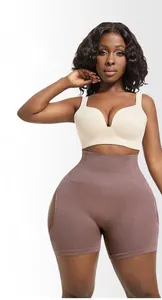 Detail of high-waisted shaping underwear with breathable texture in mauve purple