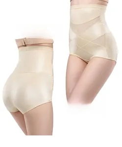Détail de gaine amincissante taille haute avec bandes croisées et maille respirante