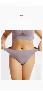 Close-up of seamless purple thong showing high elasticity and breathable mesh fabric