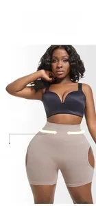 Detailed view of high waist tummy control shapewear in beige with seamless elastic fabric