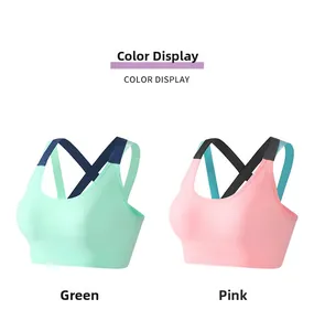 Detail of green and pink seamless sports bras with criss-cross back straps design