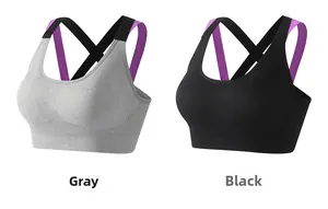 Detail of grey and black sports bras showing cross-back straps and wide support band