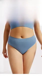 Detail of seamless blue athletic thong and sports bra set showing elastic fabric texture