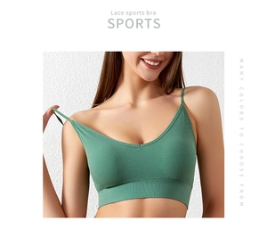 Detailed ribbed texture of green wireless lace sports bra with slim shoulder straps