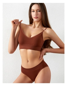 Detailed close-up of terracotta ribbed seamless lingerie set with V-neck bra and panties